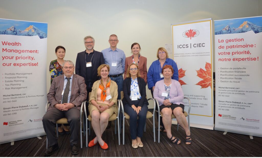 Delegates at the 2024 ICCS Annual General Meeting. Clockwise from top left: Yazu Norie (Japanese Association for Canadian Studies); Christoph Vatter (Association for Canadian Studies in German-speaking Countries); Janne Korkka (Nordic Association for Canadian Studies); Yulia Bosworth (American Council for Quebec Studies); Françoise Le Jeune (French Association for Canadian Studies), Katalin Kürtösi (Central European Association for Canadian Studies); Anna Branach-Kallas (ICCS); Jane Koustas (ICCS); John Maher (ICCS) Délégués à l’ Assemblée générale annuelle du Conseil international d'études canadiennes de 2024. Dans le sens horaire à partir du coin supérieur gauche : Yazu Norie (Japanese Association for Canadian Studies); Christoph Vatter (Association d’Études Canadiennes dans les Pays de Langue Allemande); Janne Korkka (Nordic Association for Canadian Studies); Yulia Bosworth (Conseil américain des études québécoises); Françoise Le Jeune (Association française en études canadiennes); Katalin Kürtösi (Association d'études canadiennes en Europe centrale); Anna Branach-Kallas (CIEC); Jane Koustas (CIEC); John Maher (CIEC)