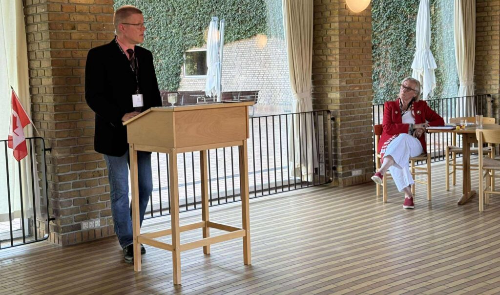 Janne Korkka at the opening session with the Canadian Ambassador, Conference session, NACS conference 2025; Le président Janne Korkka à la séance d’ouverture avec l’ambassadeur canadien, Conférence NACS 2025